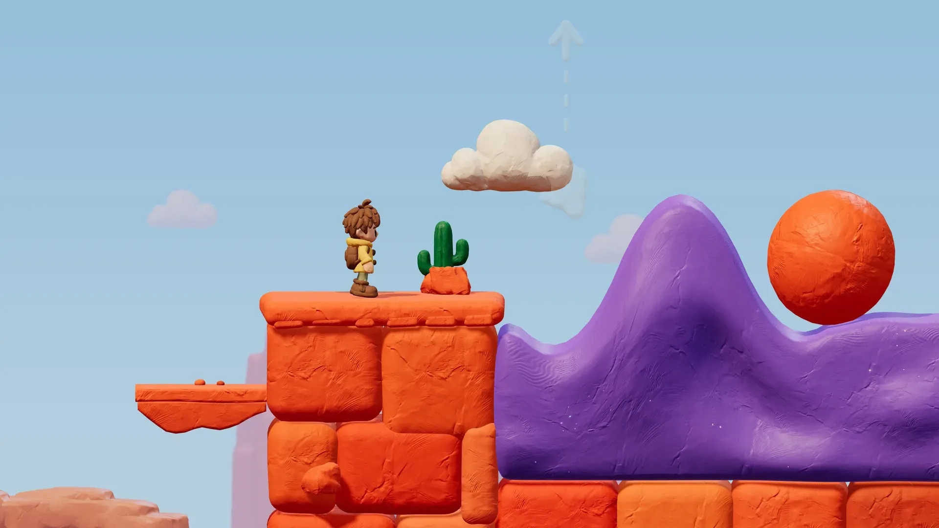 The clay hero stands by a cactus next to a purple wave of kneadable clay and an orange boulder