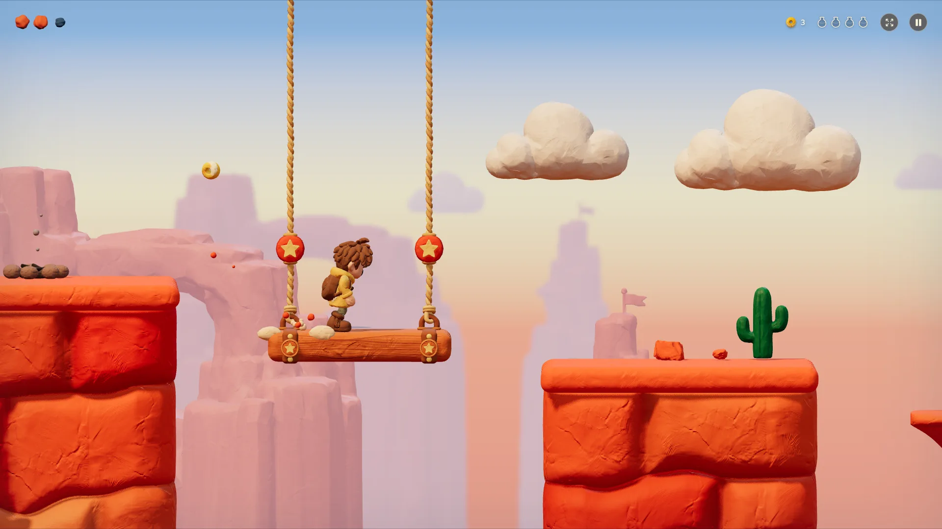 The hero rides a wooden swing hung between two clay brick pillars