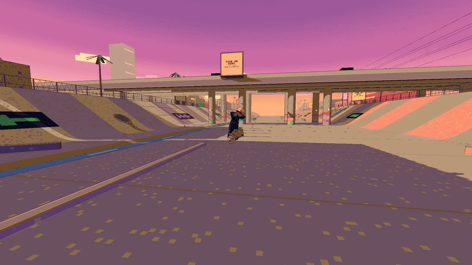Skating the concrete banks of the LA River channel under a pink evening sky