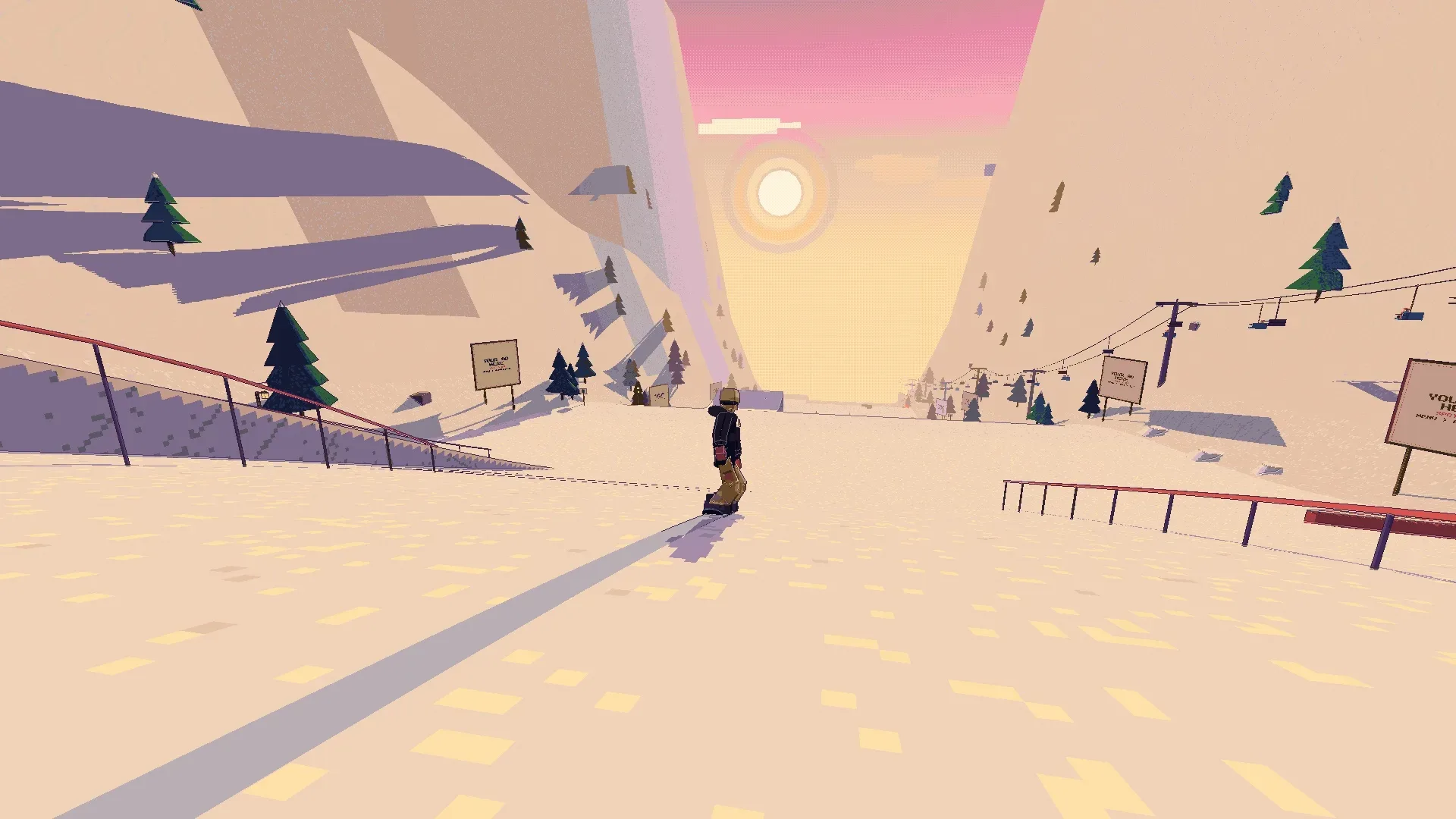 A snowboarder heads down a sunlit mountain run lined with rails and a chairlift