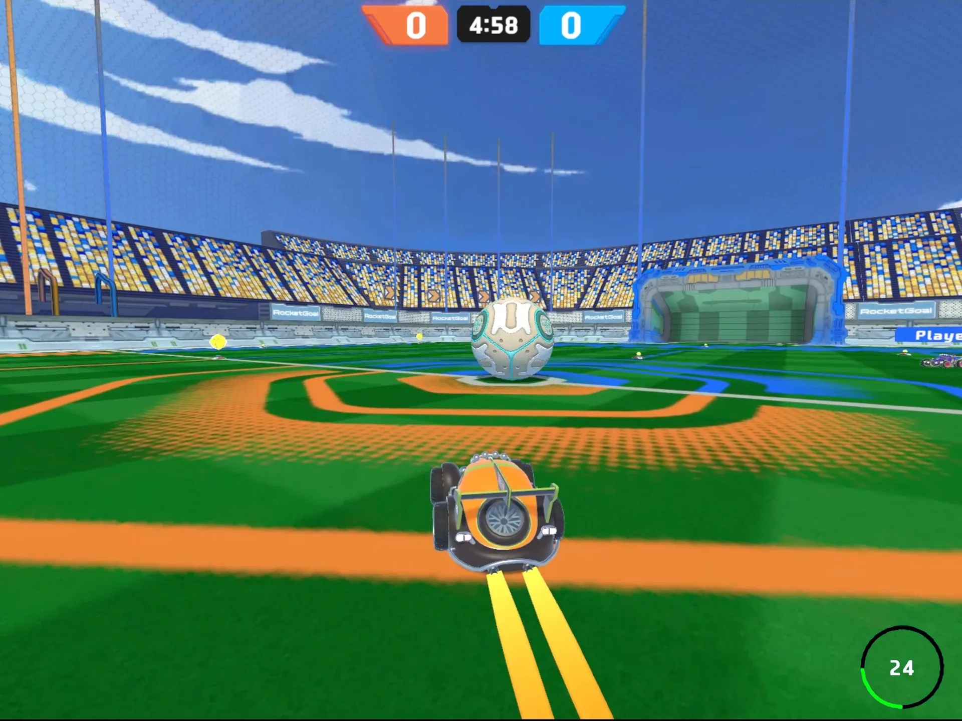 Orange car on the pitch at the start of a match in a packed stadium, score 0–0 with 4:58 on the clock, the ball ahead of it at the centre circle