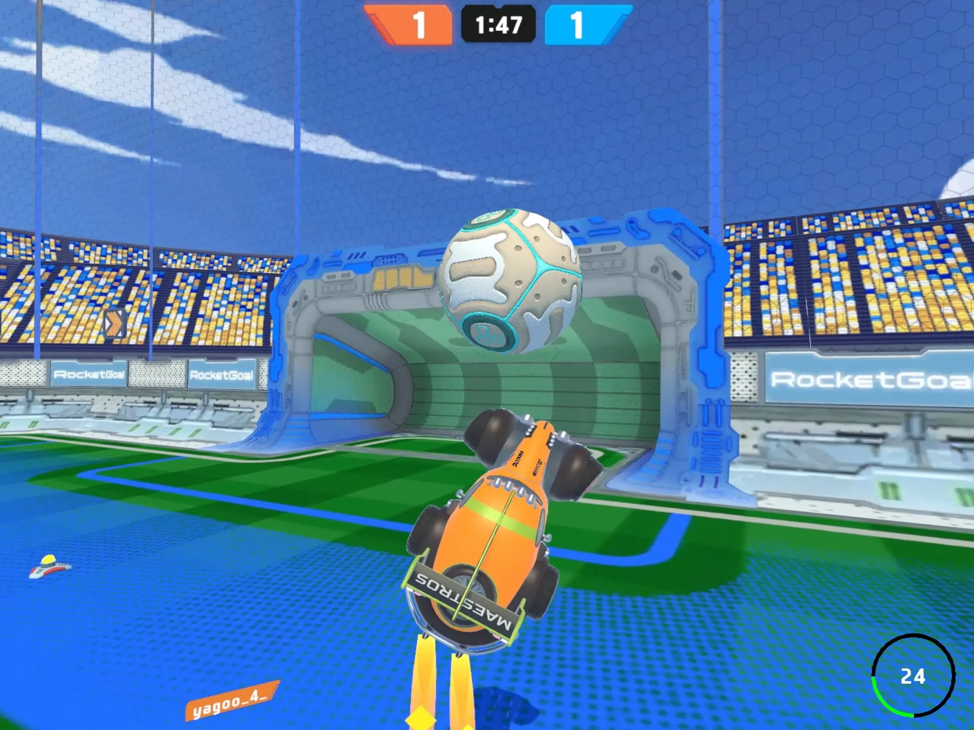 Orange car boosting toward the ball in front of a goal, score 1–1 with 1:47 left